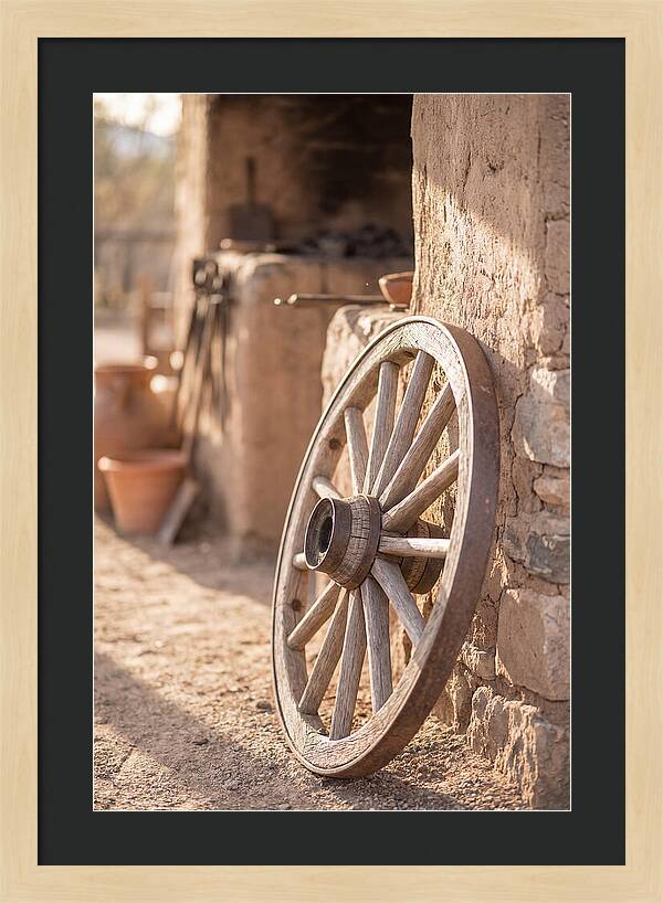 Old Wooden Wheel Against Wall