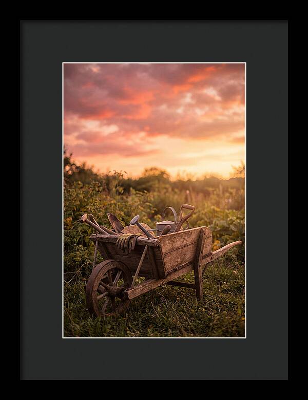 Old Wooden Wheelbarrow At Sunset