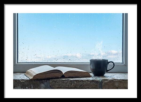 Open Book And Steaming Cup