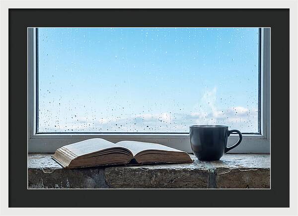 Open Book And Steaming Cup