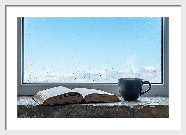 Open Book And Steaming Cup