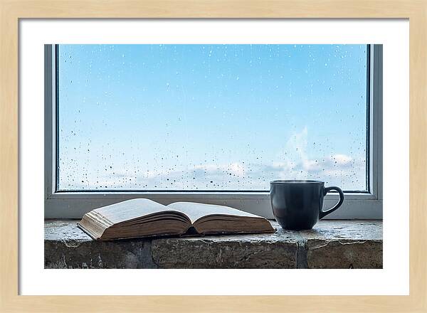 Open Book And Steaming Cup