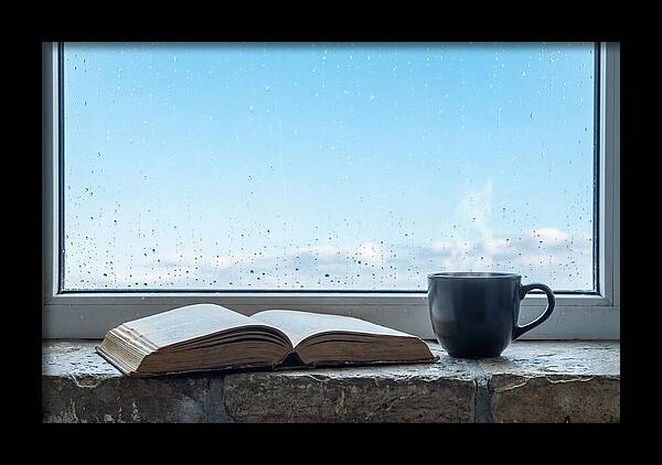 Open Book And Steaming Cup