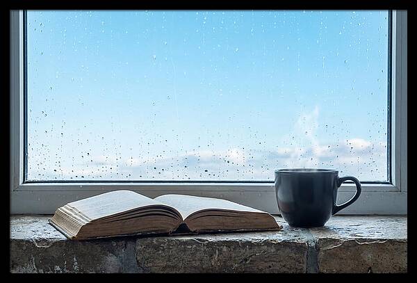 Open Book And Steaming Cup
