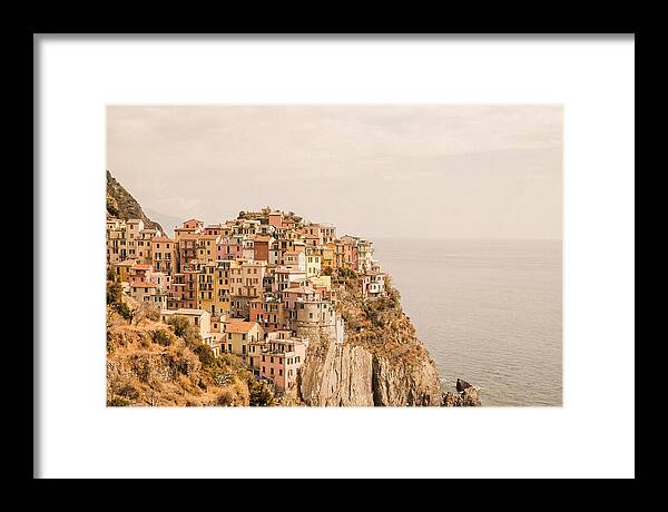 Pastel Village On Dramatic Cliffs