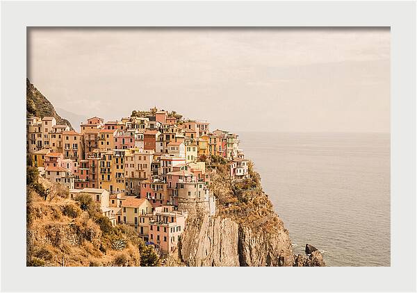 Pastel Village On Dramatic Cliffs
