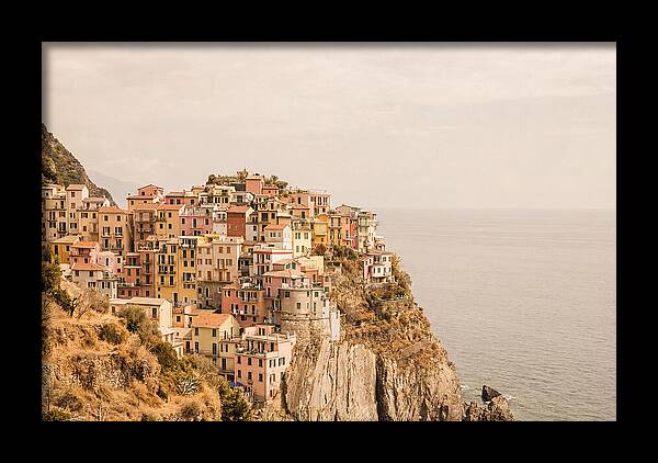 Pastel Village On Dramatic Cliffs