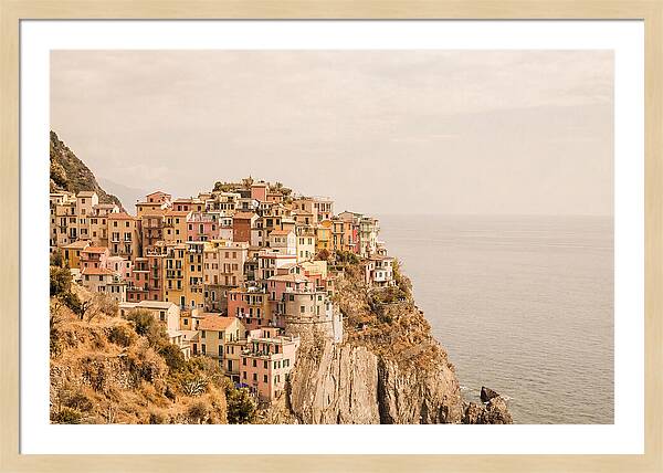 Pastel Village On Dramatic Cliffs
