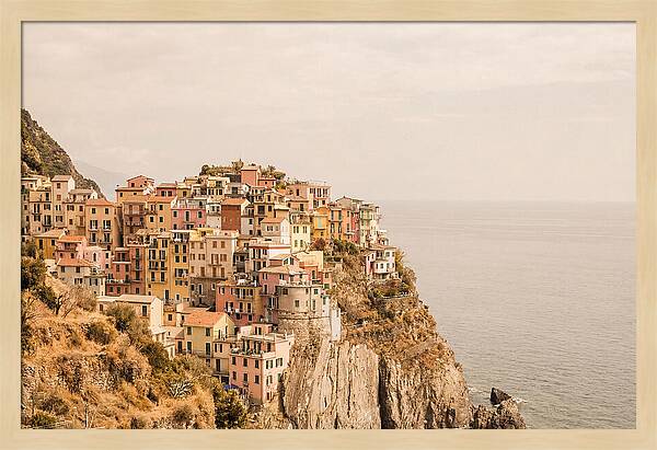 Pastel Village On Dramatic Cliffs