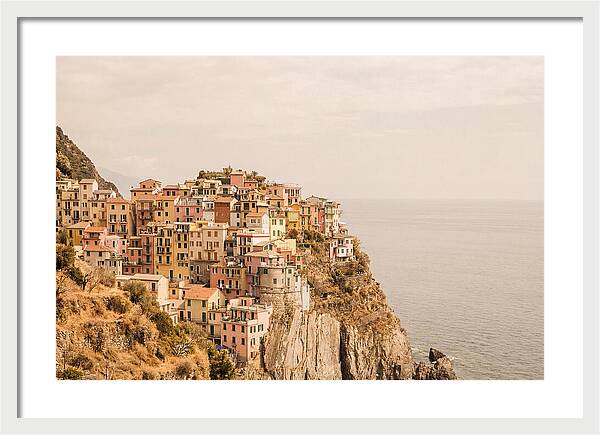 Pastel Village On Dramatic Cliffs