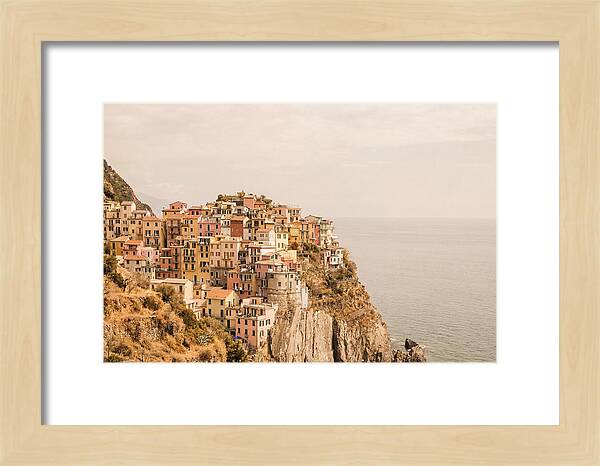 Pastel Village On Dramatic Cliffs