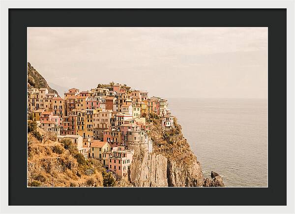 Pastel Village On Dramatic Cliffs