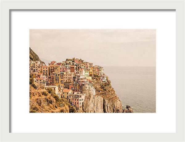 Pastel Village On Dramatic Cliffs