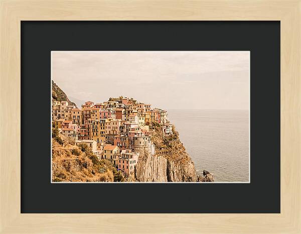 Pastel Village On Dramatic Cliffs