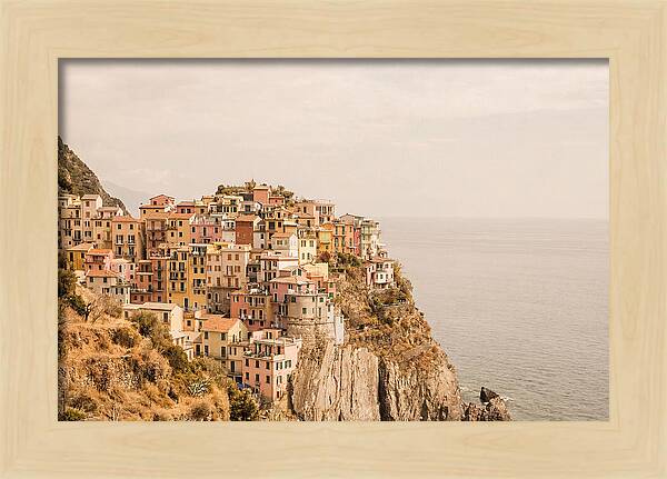 Pastel Village On Dramatic Cliffs