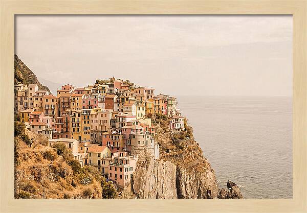 Pastel Village On Dramatic Cliffs