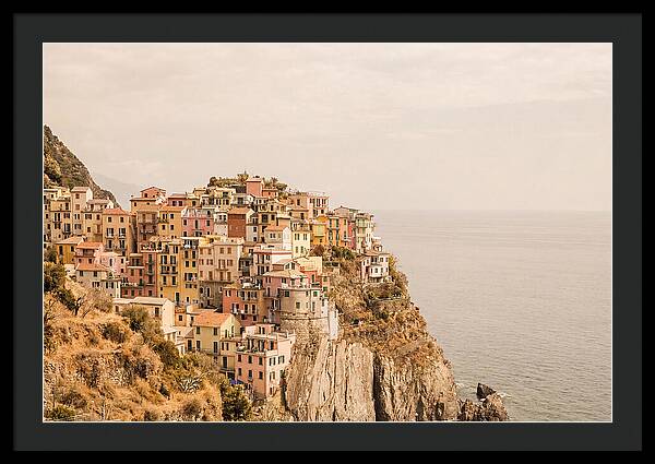 Pastel Village On Dramatic Cliffs