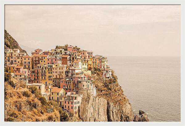 Pastel Village On Dramatic Cliffs