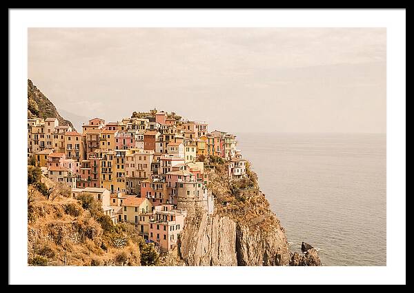 Pastel Village On Dramatic Cliffs