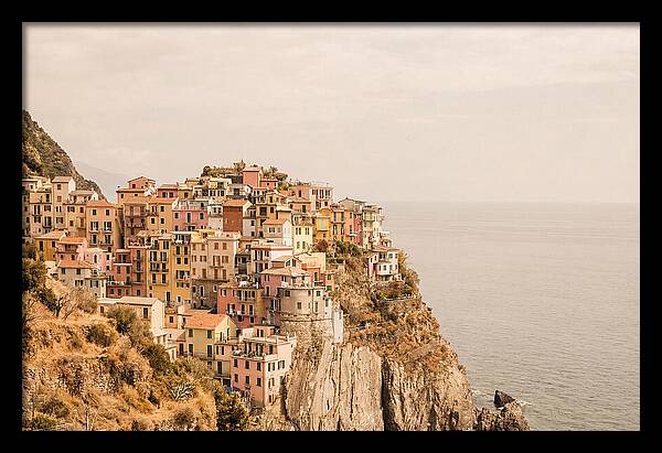 Pastel Village On Dramatic Cliffs