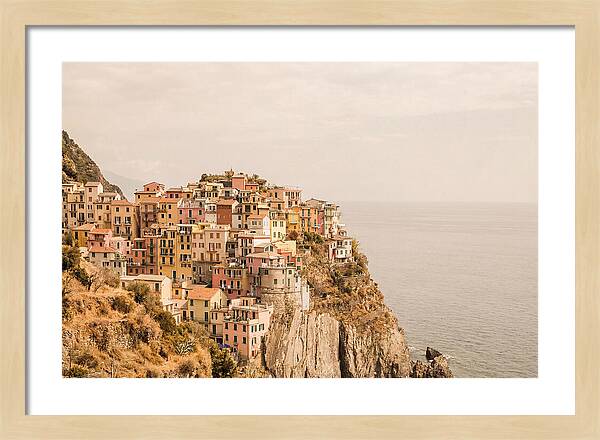 Pastel Village On Dramatic Cliffs