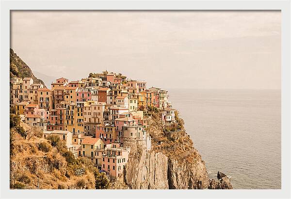 Pastel Village On Dramatic Cliffs