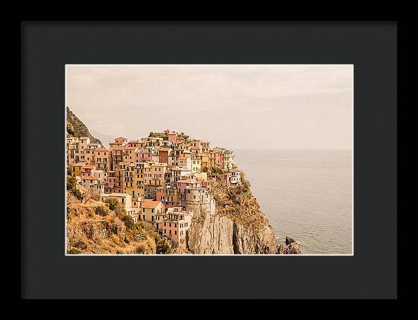Pastel Village On Dramatic Cliffs