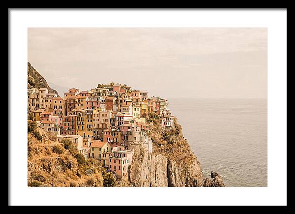 Pastel Village On Dramatic Cliffs