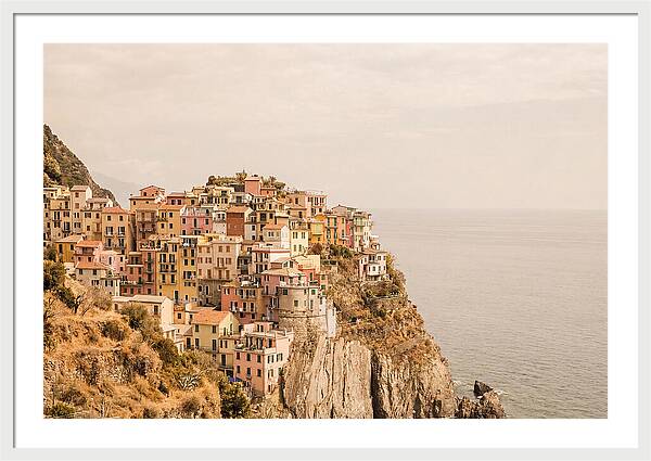 Pastel Village On Dramatic Cliffs