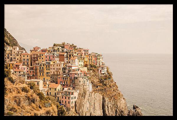 Pastel Village On Dramatic Cliffs