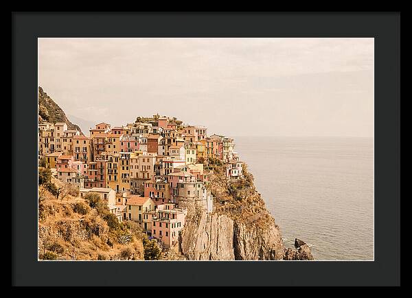Pastel Village On Dramatic Cliffs