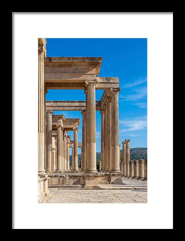 Peristyle Columns Under Blue Sky