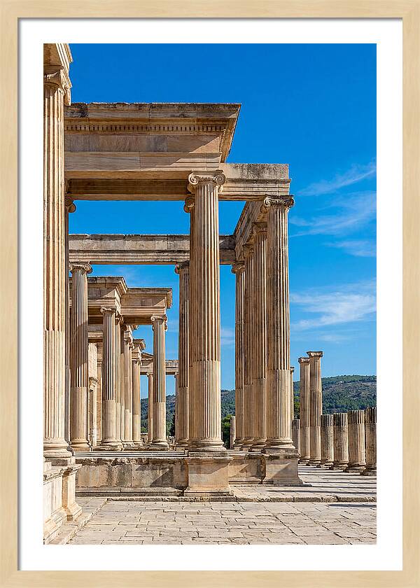 Peristyle Columns Under Blue Sky