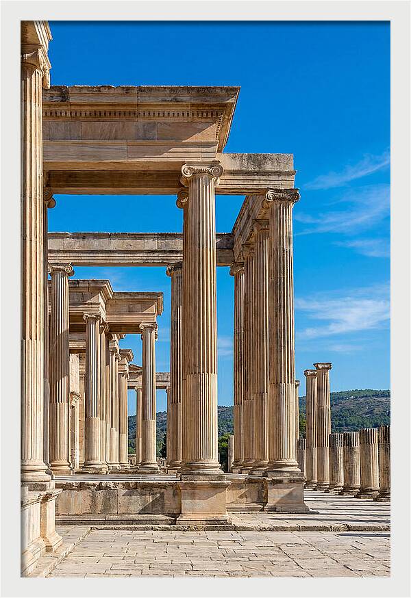 Peristyle Columns Under Blue Sky