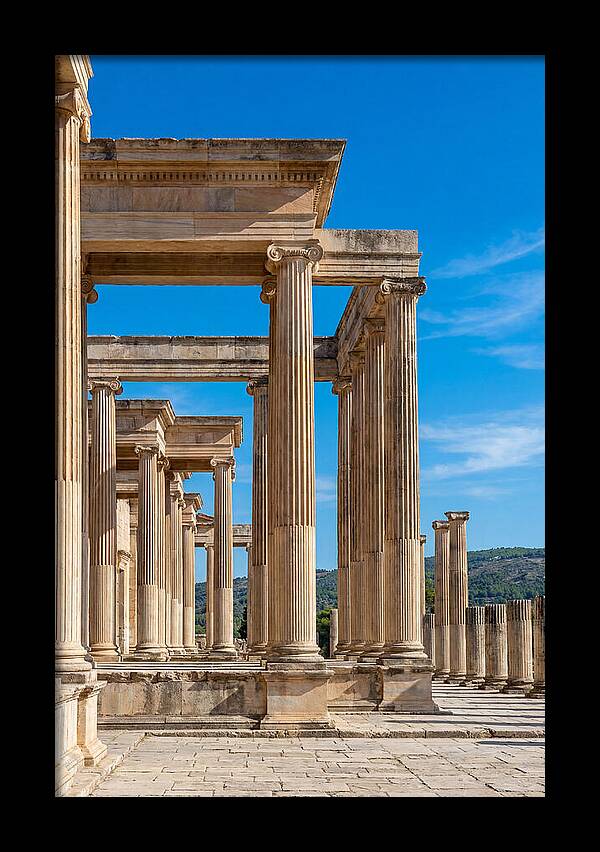 Peristyle Columns Under Blue Sky