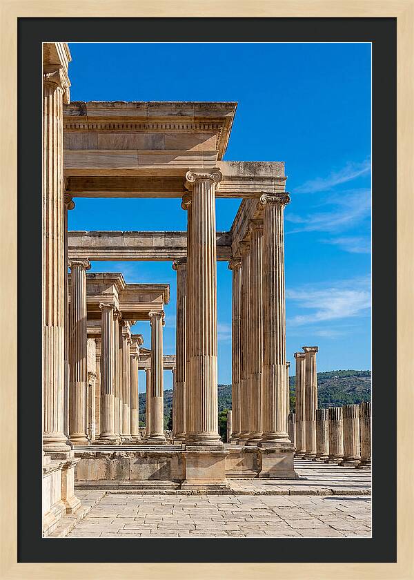 Peristyle Columns Under Blue Sky