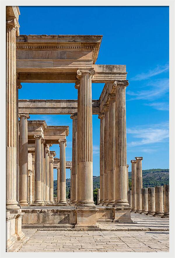 Peristyle Columns Under Blue Sky