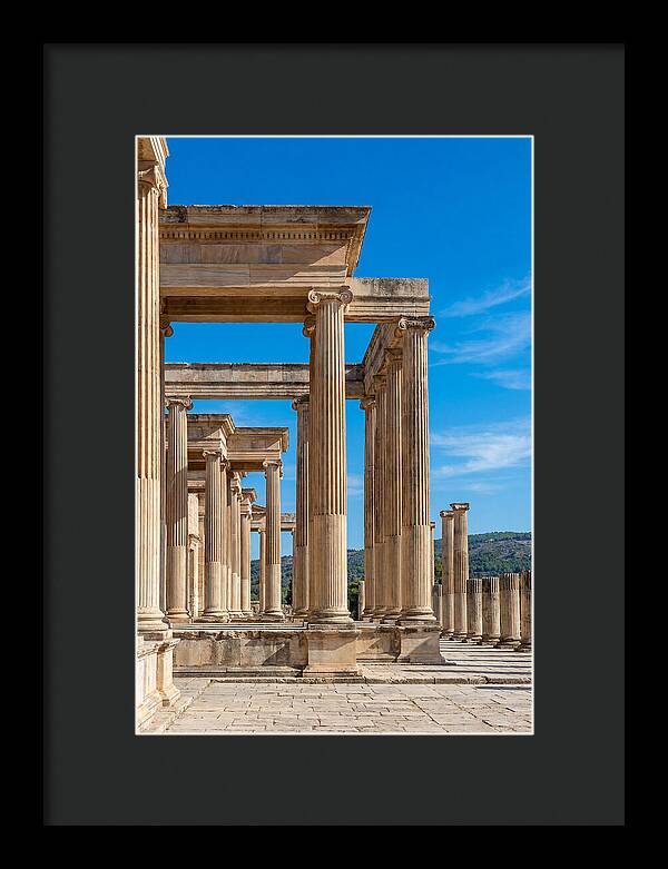 Peristyle Columns Under Blue Sky