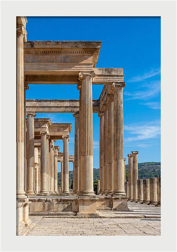 Peristyle Columns Under Blue Sky