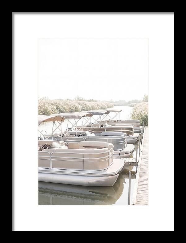 Pontoon Boats Along Reed Lined River