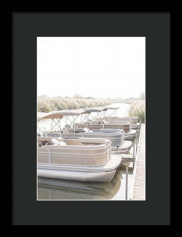 Pontoon Boats Along Reed Lined River