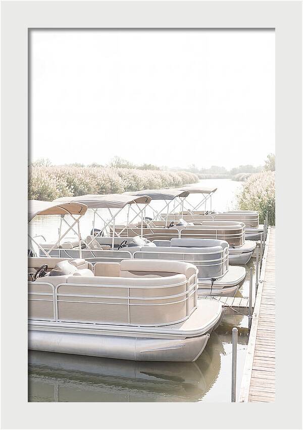 Pontoon Boats Along Reed Lined River