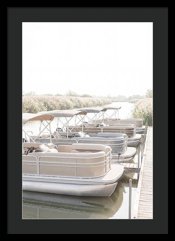 Pontoon Boats Along Reed Lined River