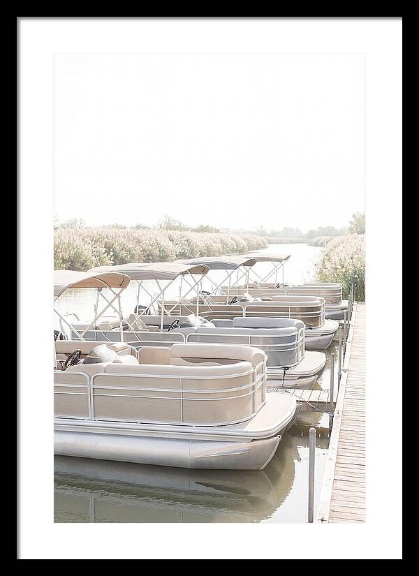 Pontoon Boats Along Reed Lined River