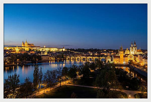 Prague Illuminated At Dusk