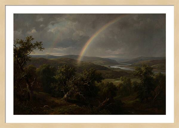 Rainbow Over Serene Landscape