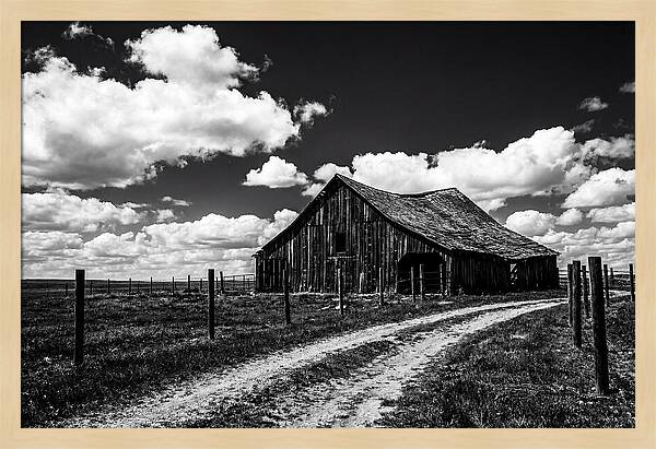 Red Barn Under Dramatic Skies