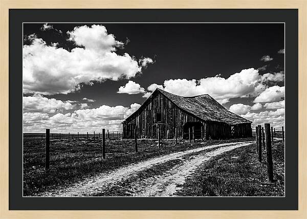 Red Barn Under Dramatic Skies