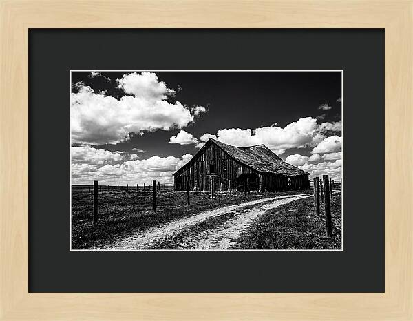 Red Barn Under Dramatic Skies