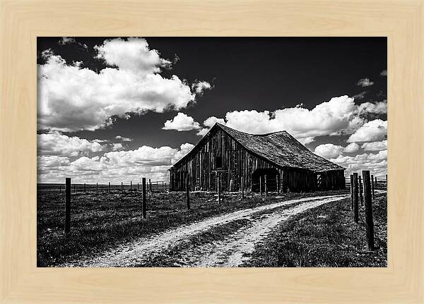 Red Barn Under Dramatic Skies